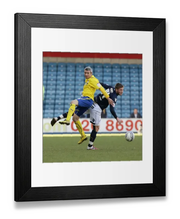 Framed Print : Millwall vs. Cardiff City: A Championship Battle at The New Den - Henry vs. McNaughton (19-03-2011)