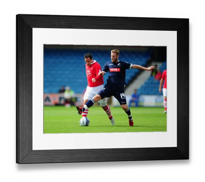 Framed Print : Battle for Supremacy: Millwall's James Henry vs. Nottingham Forest's Andy Reid in the Npower Championship Clash (Millwall v Nottingham Forest, The Den, 13-08-2011) Framed Print : Battle for Supremacy: Millwall's James Henry vs. Nottingham Forest's Andy Reid in the Npower Championship Clash (Millwall v Nottingham Forest, The Den, 13-08-2011)