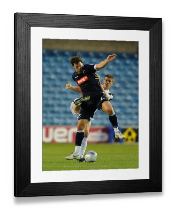 Framed Print : Millwall vs Peterborough United: Clash at The Den - Henderson vs Bennett (Npower Championship, 17-08-2011) Framed Print : Millwall vs Peterborough United: Clash at The Den - Henderson vs Bennett (Npower Championship, 17-08-2011)