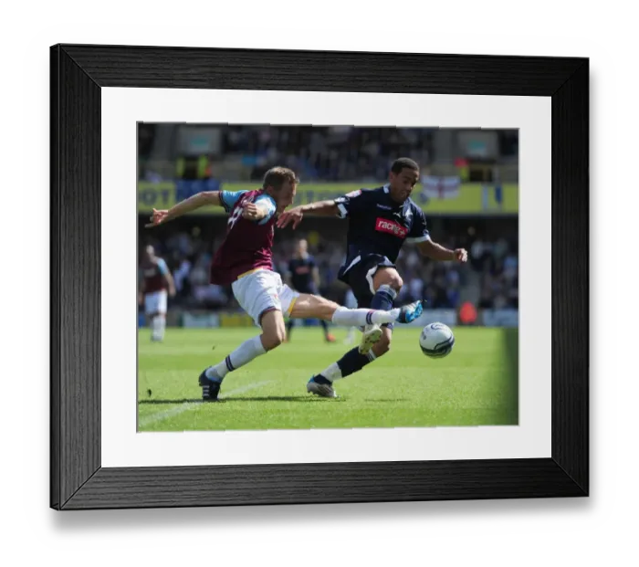 Framed Print : Battle for the Ball: Feeney vs. Taylor - Millwall vs. West Ham United in the Npower Championship (2011) Framed Print : Battle for the Ball: Feeney vs. Taylor - Millwall vs. West Ham United in the Npower Championship (2011)