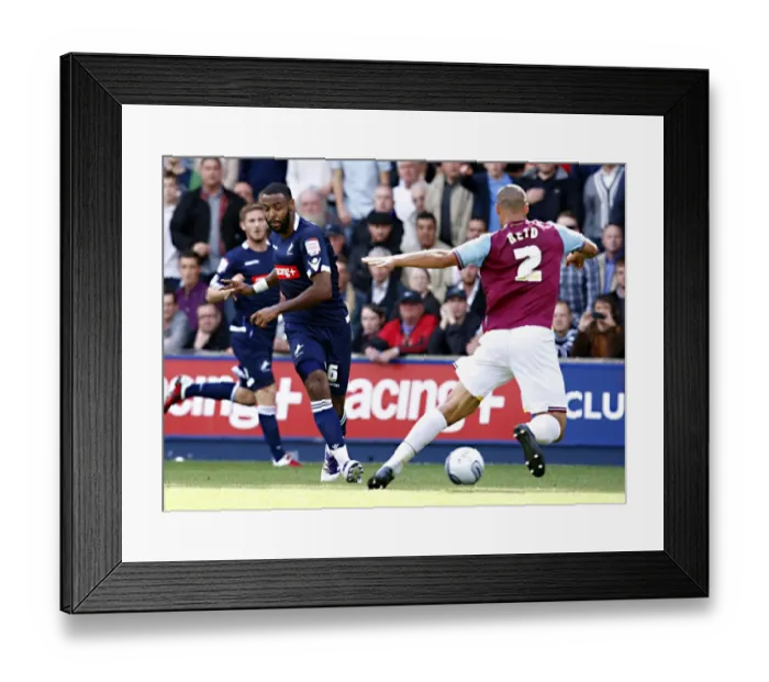 Framed Print : Millwall vs. West Ham United: Liam Trotter vs. Winston Reid in the Npower Championship Clash at The Den Framed Print : Millwall vs. West Ham United: Liam Trotter vs. Winston Reid in the Npower Championship Clash at The Den