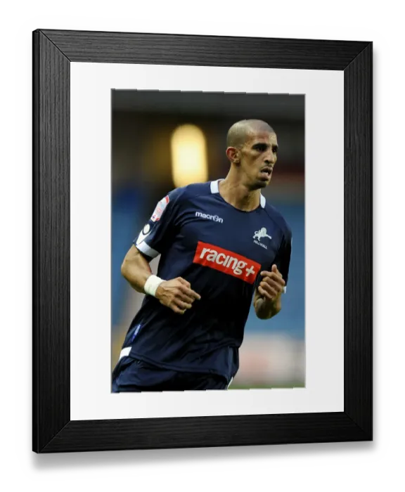 Framed Print : Millwall's Hameur Bouazza in Action Against Peterborough United (2011) Framed Print : Millwall's Hameur Bouazza in Action Against Peterborough United (2011)