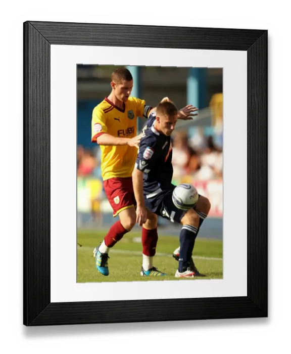Framed Print : Battleground The Den: Millwall vs. Burnley - Chris McCann vs. James Henry in Npower Championship Clash (10-01-2011) Framed Print : Battleground The Den: Millwall vs. Burnley - Chris McCann vs. James Henry in Npower Championship Clash (10-01-2011)