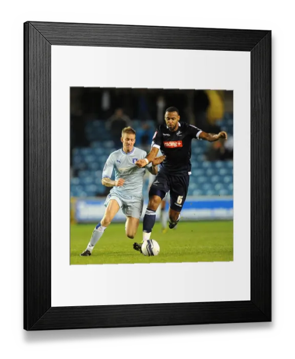 Framed Print : Battle for the Ball: Millwall vs. Coventry City in the Npower Championship - A Clash of Supremacy (01-11-2011)
