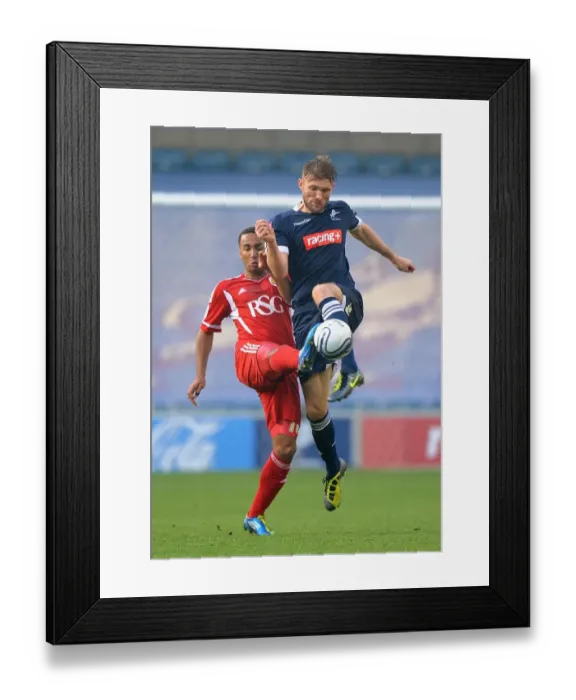 Framed Print : Battle at The Den: Maynard vs. Ward in Millwall vs. Bristol City Npower Championship Clash