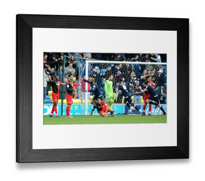 Framed Print : Millwall vs Portsmouth in the Npower Championship: Danny N'Guessan Scores the First Goal at The Den