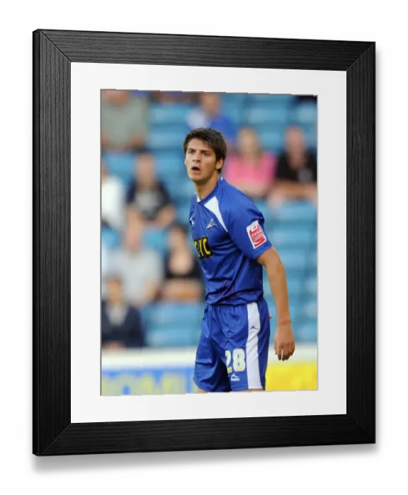Framed Print : Millwall's George Friend in Action against Oldham Athletic at The New Den (Football League One, August 18, 2009) Framed Print : Millwall's George Friend in Action against Oldham Athletic at The New Den (Football League One, August 18, 2009)