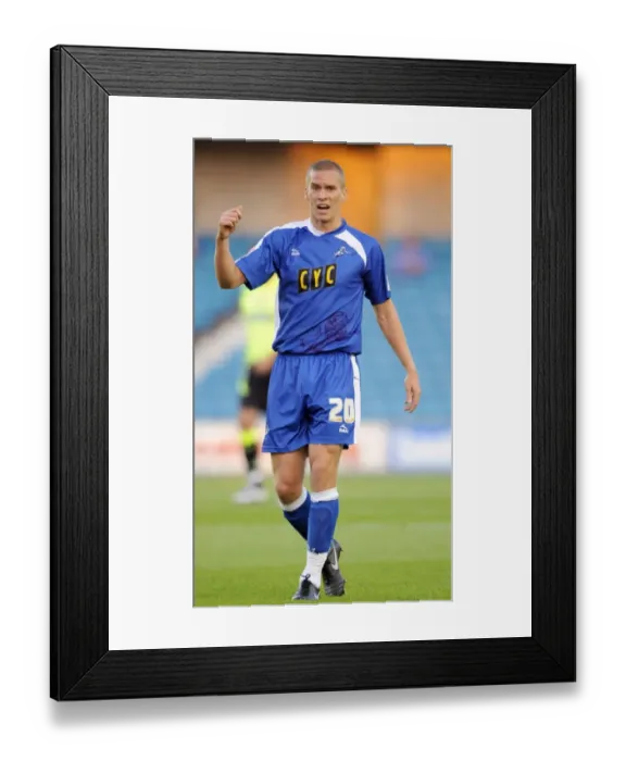 Framed Print : A Tense Battle at The New Den: Millwall vs Oldham Athletic in Football League One (August 18, 2009) Framed Print : A Tense Battle at The New Den: Millwall vs Oldham Athletic in Football League One (August 18, 2009)