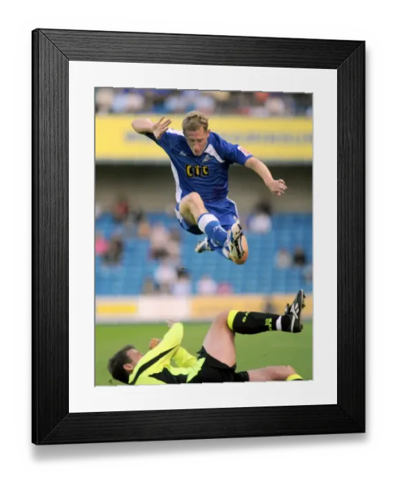 Framed Print : Millwall's David Martin in Action Against Oldham Athletic (18-08-2009, The New Den) Framed Print : Millwall's David Martin in Action Against Oldham Athletic (18-08-2009, The New Den)