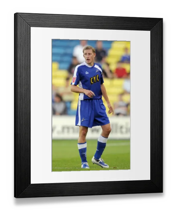 Framed Print : Determined David Martin Leads Millwall to Victory: Millwall vs Oldham Athletic in Football League One (August 18, 2009) Framed Print : Determined David Martin Leads Millwall to Victory: Millwall vs Oldham Athletic in Football League One (August 18, 2009)