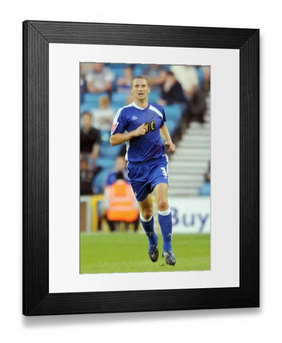 Framed Print : A Tense Moment at The New Den: Millwall vs Oldham Athletic in Football League One (2009) Framed Print : A Tense Moment at The New Den: Millwall vs Oldham Athletic in Football League One (2009)