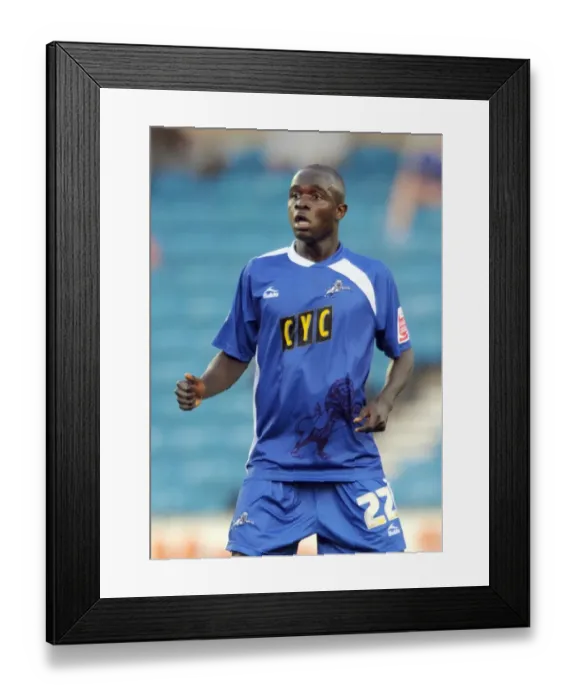 Framed Print : A Tense Moment at The New Den: Millwall's Ali Fuseini Faces Off Against Oldham Athletic in Football League One (August 18, 2009) Framed Print : A Tense Moment at The New Den: Millwall's Ali Fuseini Faces Off Against Oldham Athletic in Football League One (August 18, 2009)