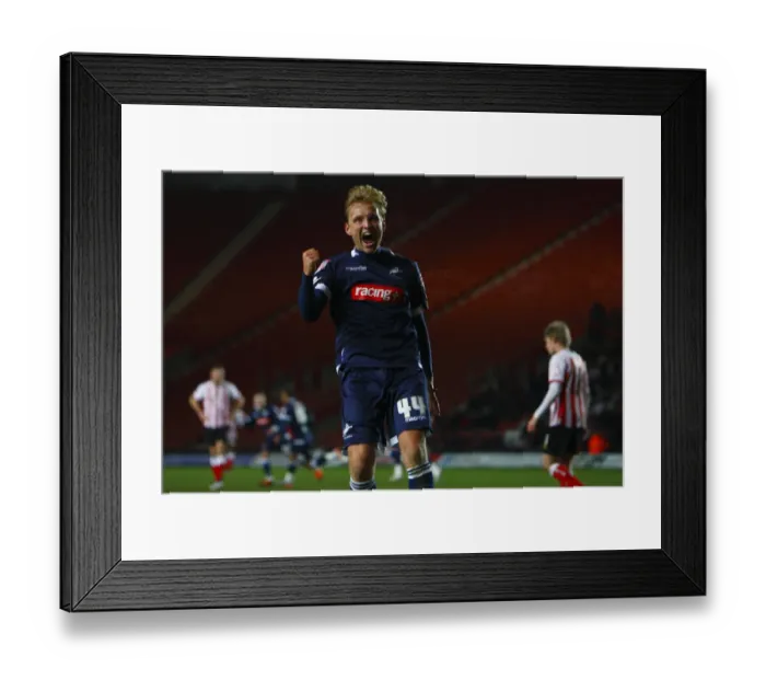 Framed Print : Millwall's Dramatic FA Cup Upset: Liam Feeny's Last-Minute Winner Against Southampton (February 7, 2012)