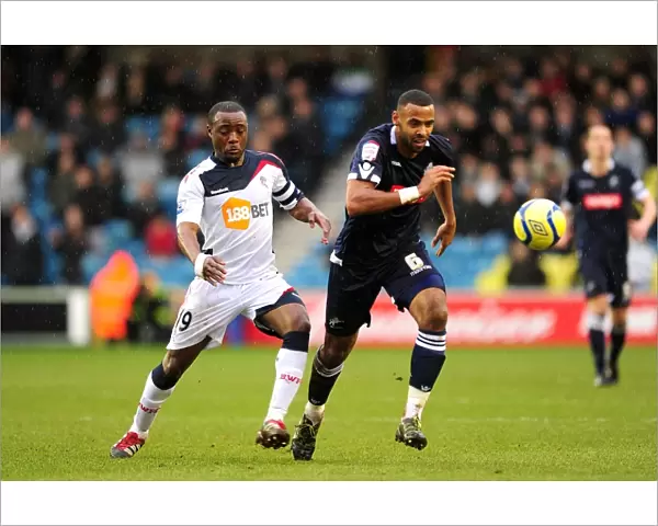 Millwall vs. Bolton Wanderers: Fifth Round FA Cup Clash - Intense Battle Between Nigel Reo-Coker and Liam Trotter
