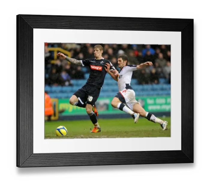 Framed Print : Millwall vs Bolton Wanderers: FA Cup Fifth Round Clash - Intense Battle Between Andrew Keogh and Samuel Ricketts Framed Print : Millwall vs Bolton Wanderers: FA Cup Fifth Round Clash - Intense Battle Between Andrew Keogh and Samuel Ricketts