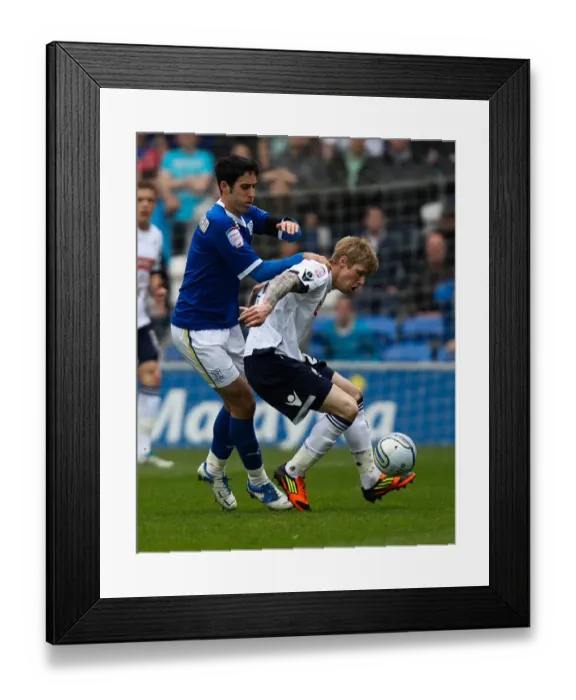 Framed Print : Millwall's Andy Keogh Holds Off Cardiff City's Peter Whittingham in Npower Championship Clash