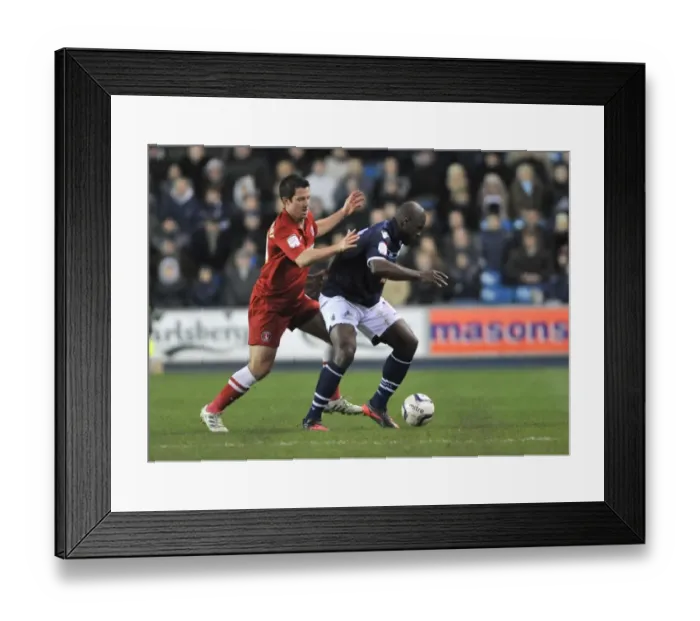 Framed Print : Millwall vs Charlton Athletic: Clash between Kermorgant and Shittu in the Npower Championship at The Den Framed Print : Millwall vs Charlton Athletic: Clash between Kermorgant and Shittu in the Npower Championship at The Den
