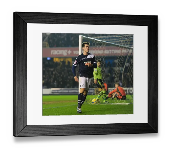 Framed Print : Millwall's John Marquis: Celebrating the Shocking Second Goal Against Aston Villa in FA Cup Round 4 (25-01-2013) Framed Print : Millwall's John Marquis: Celebrating the Shocking Second Goal Against Aston Villa in FA Cup Round 4 (25-01-2013)