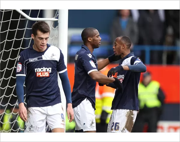 Millwall's Triumph: Guessan and Abdou Celebrate Third Goal vs. Luton Town in FA Cup Fifth Round