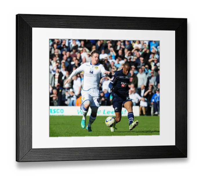 Framed Print : Battle for Supremacy: McCormack vs. Abdou in the Npower Championship Clash between Leeds United and Millwall at Elland Road