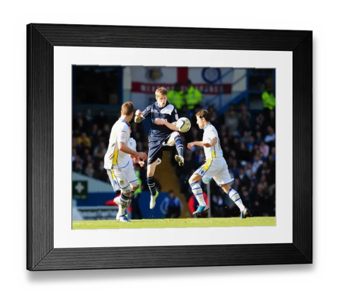 Framed Print : Battleground Elland Road: Michael Brown vs. Andy Keogh - Millwall vs. Leeds United, Championship Clash (02-03-2013) Framed Print : Battleground Elland Road: Michael Brown vs. Andy Keogh - Millwall vs. Leeds United, Championship Clash (02-03-2013)
