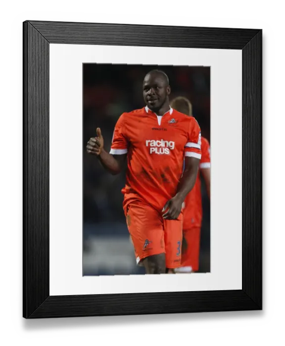 Framed Print : Millwall's Danny Shittu Faces Off Against Blackburn Rovers Fans in FA Cup Quarter Final Replay