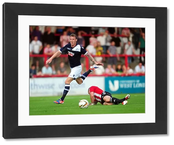 Battle for Supremacy: Woolford vs McCormack in the Pre-Season Clash between Brentford and Millwall