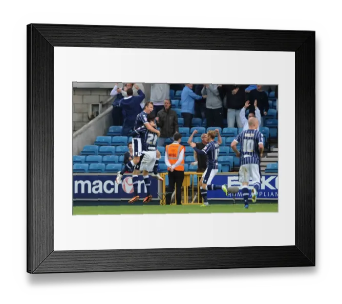 Framed Print : Millwall's Victory: Woolford Scores First Goal Against Leeds United in Sky Bet Championship Framed Print : Millwall's Victory: Woolford Scores First Goal Against Leeds United in Sky Bet Championship