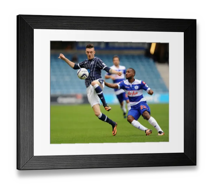 Framed Print : Millwall vs. Queens Park Rangers: Sky Bet Championship Clash at The New Den - Scott Malone and Junior Hoilett Battle It Out Framed Print : Millwall vs. Queens Park Rangers: Sky Bet Championship Clash at The New Den - Scott Malone and Junior Hoilett Battle It Out