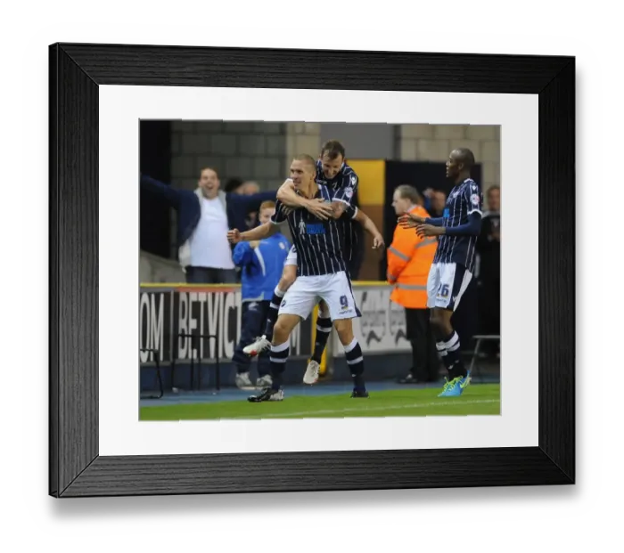 Framed Print : Millwall's Steve Morison Scores Third Goal Against Blackpool in Sky Bet Championship Match at The Den Framed Print : Millwall's Steve Morison Scores Third Goal Against Blackpool in Sky Bet Championship Match at The Den