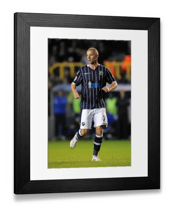 Framed Print : Millwall vs Blackpool: Sky Bet Championship Showdown at The Den - Alan Dunne in Action