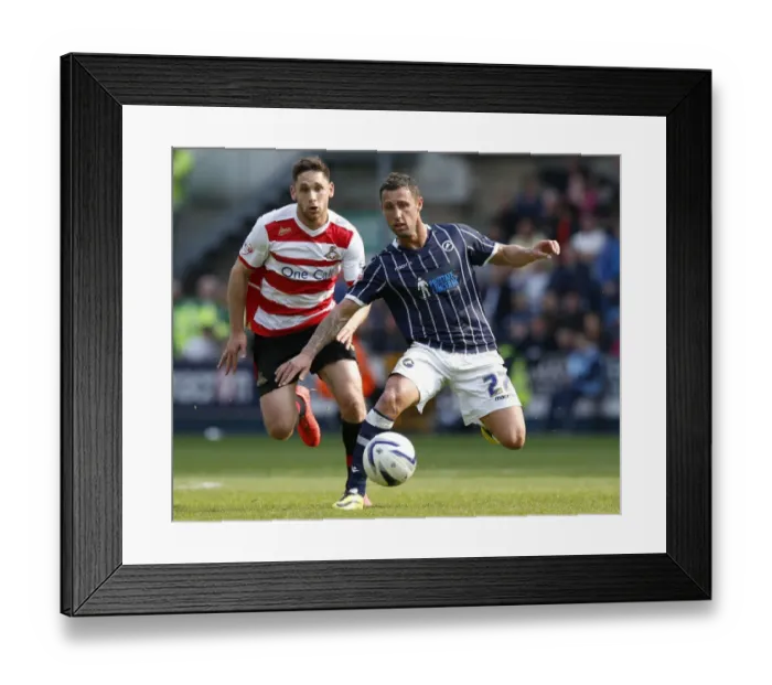 Framed Print : Millwall vs Doncaster Rovers: Scott McDonald Scores Past Dean Furman in Sky Bet Championship Clash at The New Den Framed Print : Millwall vs Doncaster Rovers: Scott McDonald Scores Past Dean Furman in Sky Bet Championship Clash at The New Den