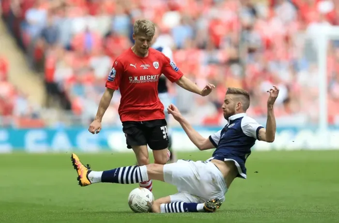 Framed Print : Barnsley's Lloyd Isgrove and Millwall's Mark Beevers Clash in League One Play-Off Final at Wembley Stadium
