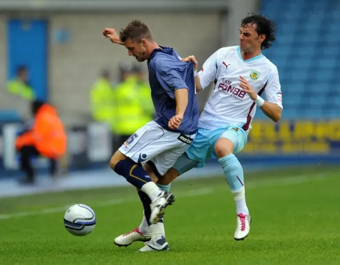 Framed Print : Battle for the Ball: Millwall vs. Burnley in the Npower Championship Framed Print : Battle for the Ball: Millwall vs. Burnley in the Npower Championship