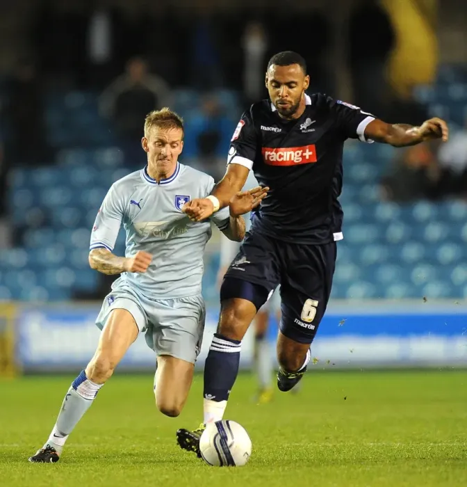 Framed Print : Battle for the Ball: Millwall vs. Coventry City in the Npower Championship - A Clash of Supremacy (01-11-2011)
