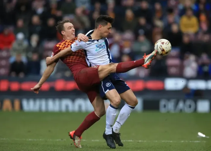 Framed Print : Battle for the Ball: Tony McMahon vs. Joe Martin in Sky Bet League One Clash between Bradford City and Millwall Framed Print : Battle for the Ball: Tony McMahon vs. Joe Martin in Sky Bet League One Clash between Bradford City and Millwall