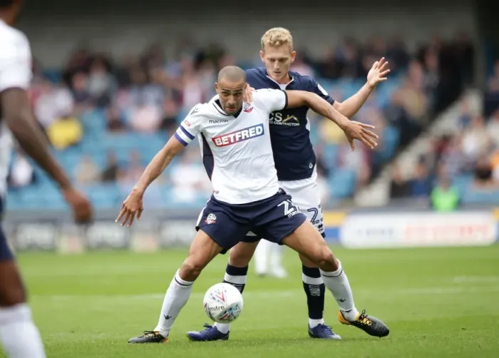 Framed Print : Battle for Supremacy: George Saville vs. Darren Pratley in Millwall vs. Bolton Wanderers, Sky Bet Championship Framed Print : Battle for Supremacy: George Saville vs. Darren Pratley in Millwall vs. Bolton Wanderers, Sky Bet Championship