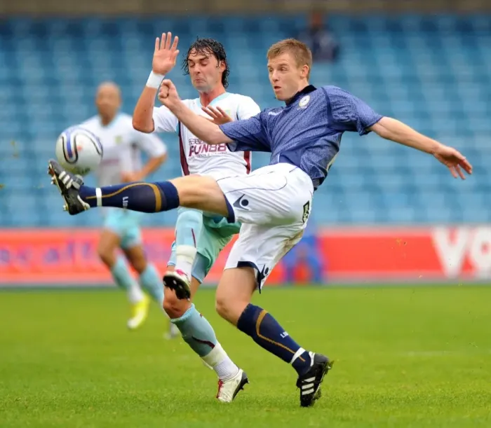 Framed Print : Battle for Supremacy: Millwall vs. Burnley in the Npower Championship