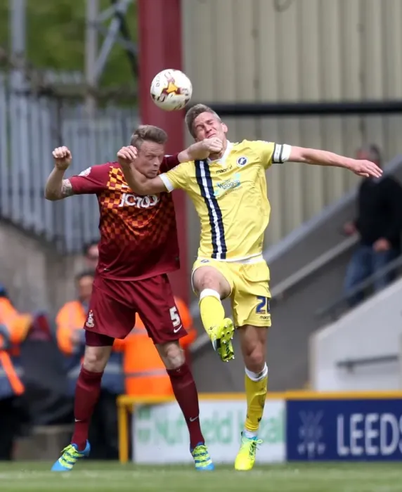Framed Print : Battle for Supremacy: Morison vs. Clarke in Millwall's Play-Off Clash with Bradford City Framed Print : Battle for Supremacy: Morison vs. Clarke in Millwall's Play-Off Clash with Bradford City