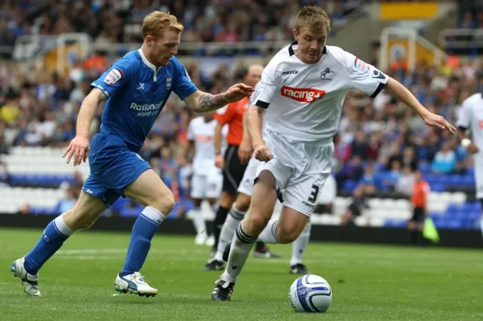 Framed Print : Battling for Supremacy: Burke vs. Craig in Millwall vs. Birmingham Championship Clash Framed Print : Battling for Supremacy: Burke vs. Craig in Millwall vs. Birmingham Championship Clash