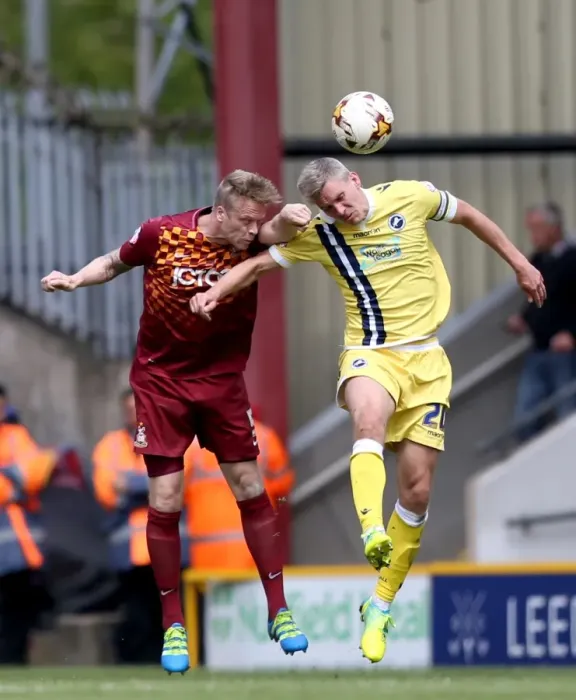 Framed Print : Bradford City vs Millwall: Intense Aerial Battle Between Steve Morison and Nathan Clarke in Play-Off First Leg Framed Print : Bradford City vs Millwall: Intense Aerial Battle Between Steve Morison and Nathan Clarke in Play-Off First Leg