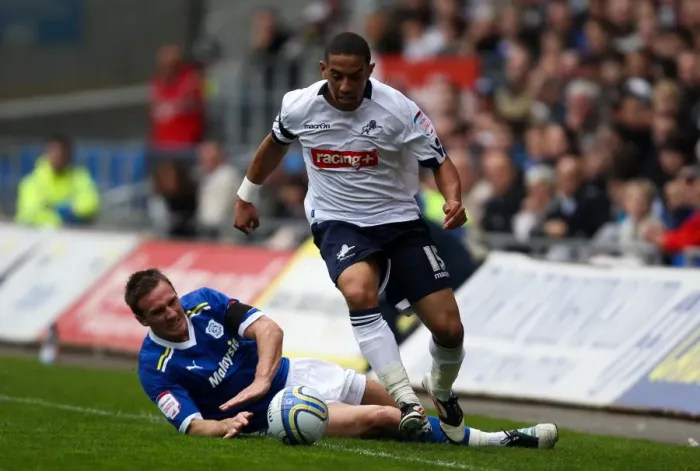 Framed Print : Feeney Escapes Lawrence's Challenge: Millwall vs. Cardiff City, Npower Championship (31-03-2012)