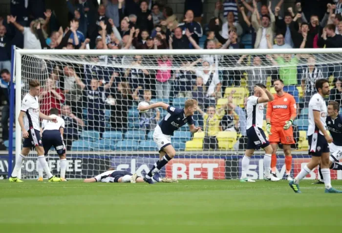 Framed Print : George Saville Scores First Goal for Millwall: A Thrilling Moment at The Den Against Bolton Wanderers in Sky Bet Championship Framed Print : George Saville Scores First Goal for Millwall: A Thrilling Moment at The Den Against Bolton Wanderers in Sky Bet Championship