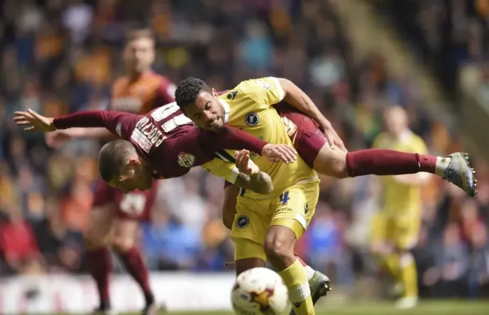 Framed Print : Intense Rivalry: Bradford City vs. Millwall - A Battle for the Ball in the Sky Bet League One Play-Offs