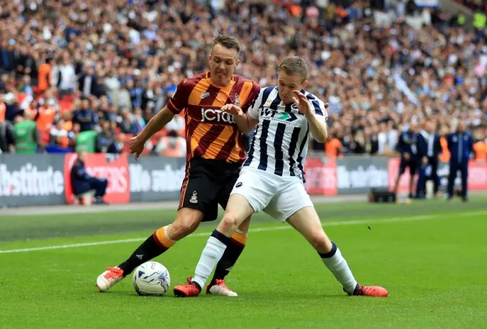 Framed Print : Intense Rivalry: McMahon vs. Ferguson's Battle for Supremacy in the Sky Bet League One Play-Off Final at Wembley Stadium