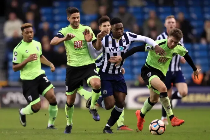 Framed Print : Intense Rivalry: Millwall vs. AFC Bournemouth in the Emirates FA Cup Third Round - Fred Onyedinma and Andrew Surman Clash for Possession