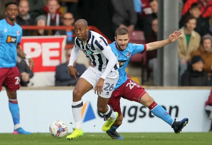 Framed Print : Intense Rivalry: Nadjim Abdou vs. Jamie Ness in the Sky Bet League One Playoff Semi-Final Clash at Scunthorpe United Framed Print : Intense Rivalry: Nadjim Abdou vs. Jamie Ness in the Sky Bet League One Playoff Semi-Final Clash at Scunthorpe United