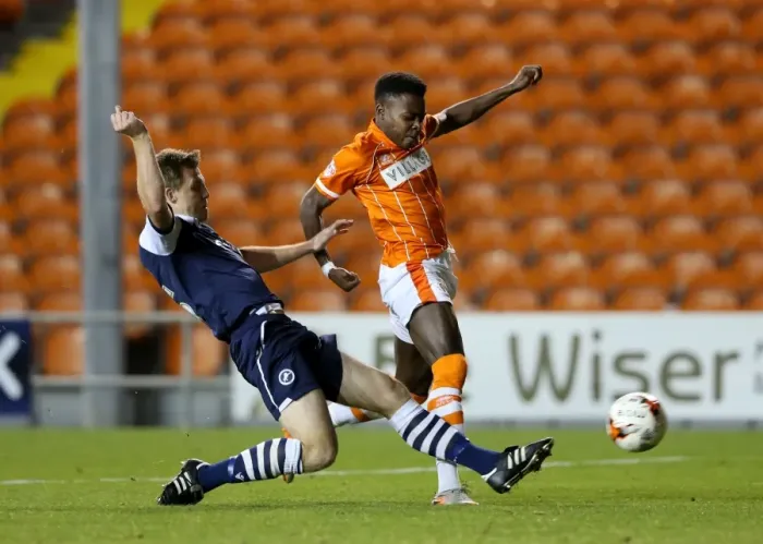 Framed Print : Intense Rivalry: Osayi-Samuel vs. Craig in Sky Bet League One Clash at Bloomfield Road Framed Print : Intense Rivalry: Osayi-Samuel vs. Craig in Sky Bet League One Clash at Bloomfield Road