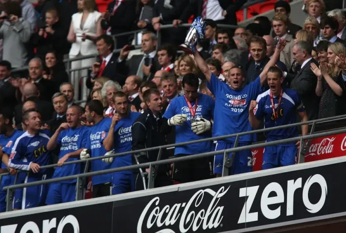 Framed Print : Millwall Football Club: Steve Morison Lifts the League One Play-Off Trophy at Wembley Stadium (The Triumphant Moment) Framed Print : Millwall Football Club: Steve Morison Lifts the League One Play-Off Trophy at Wembley Stadium (The Triumphant Moment)
