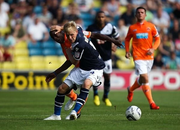 Millwall vs. Blackpool: Intense Battle for Possession - The Den (August 18, 2012)